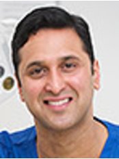 Dr Ravi Kambow