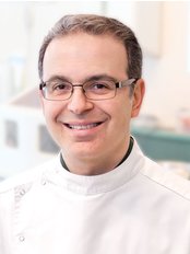 Dr Sam Etemadi